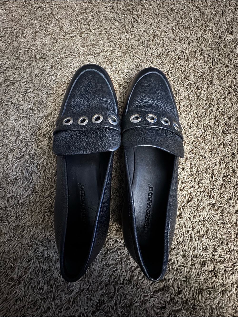 Bernardo Black Leather Loafers with Silver Grommet Trim